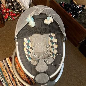 Lightly used baby swing with Bluetooth. 

Charger and charger block included